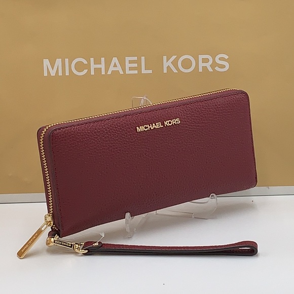 MICHAEL KORS
Leather Continental Wristlet Phone Case Wallet
Oxblood
NWT - Picture 9 of 16